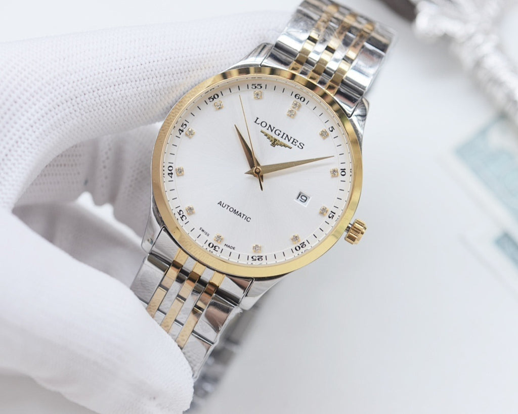 Two-tone Longines wristwatch with white dial and gold indices on a metal bracelet.