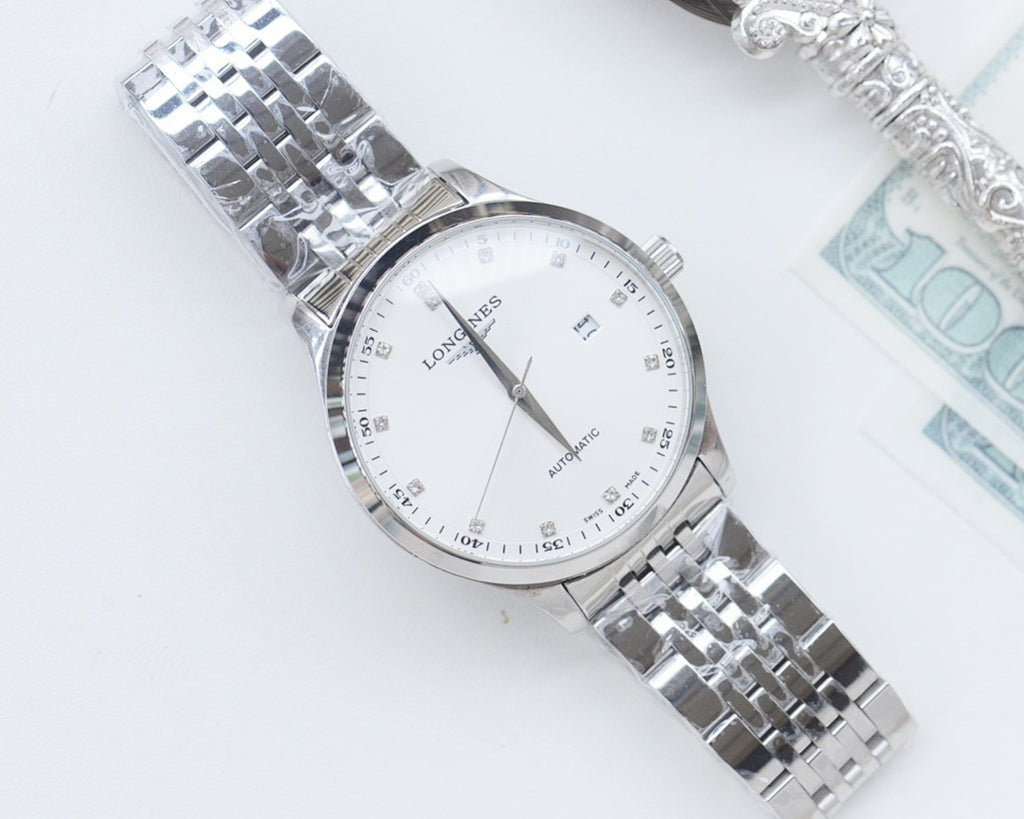 Stainless steel Longines wristwatch with white dial and metal link bracelet.