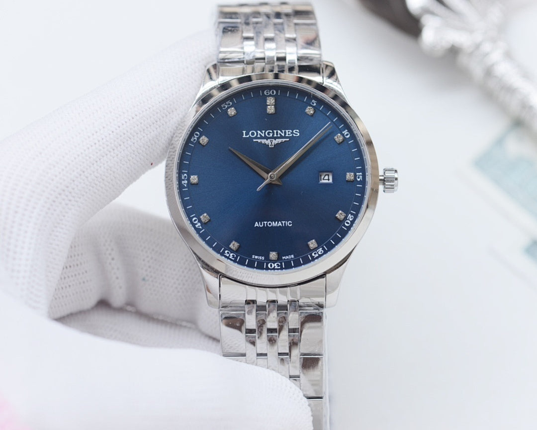 Stainless steel Longines wristwatch with blue dial, silver hands, and metal bracelet.