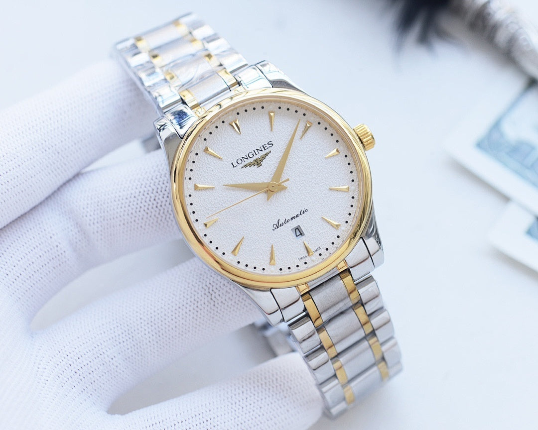 Longines wristwatch, light dial with gold-tone markers, gold-trim bezel, metal bracelet.