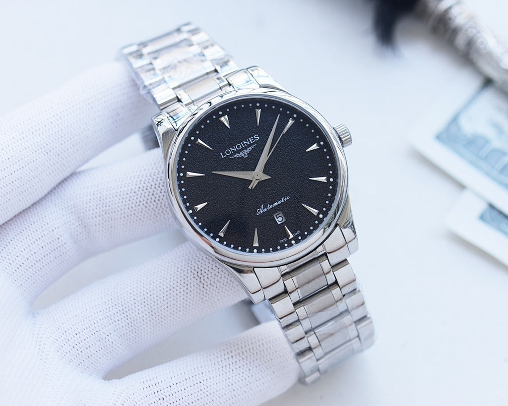 Longines wristwatch, dark dial and silver case, linked metal bracelet, crown at 3.