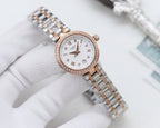Two-tone Longines watch with white dial, roman numerals, and crystal-studded bezel