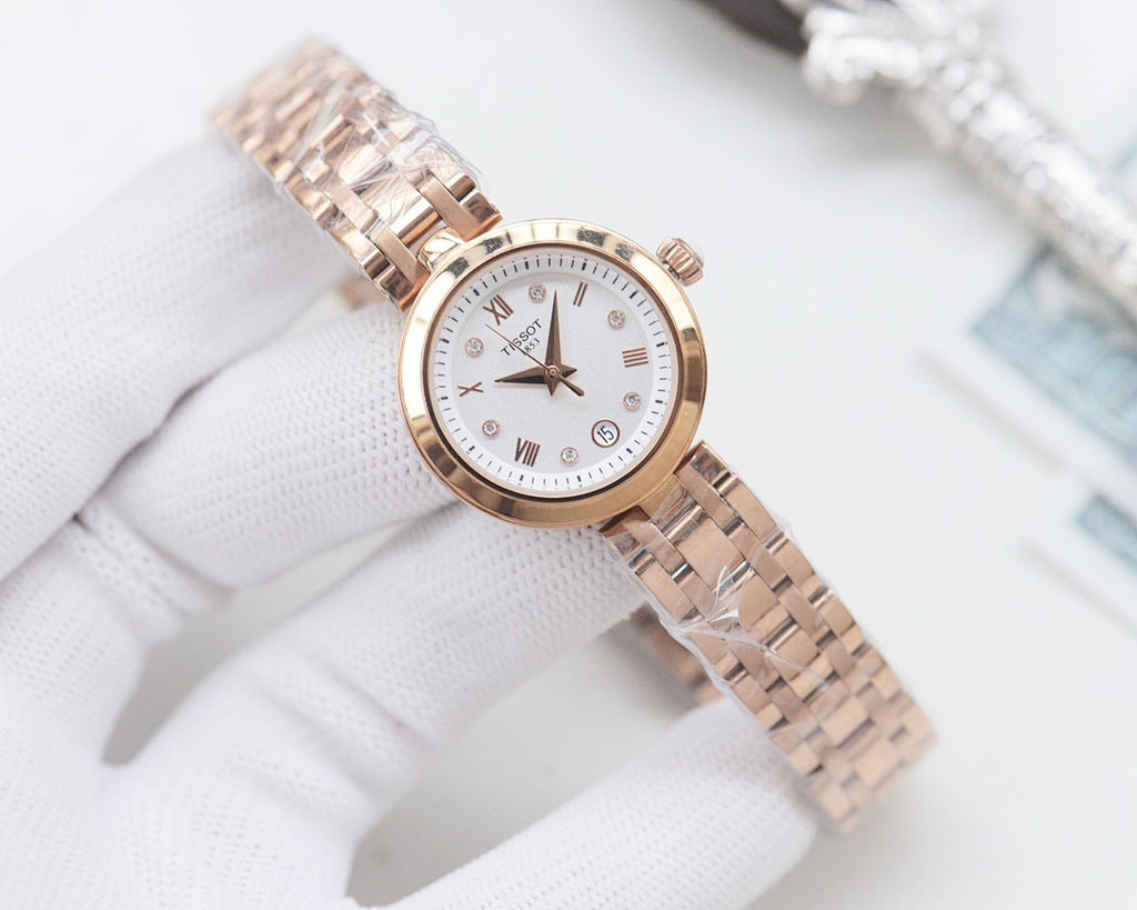 Rose-gold dial Longines watch on metal mesh bracelet with roman numeral markers