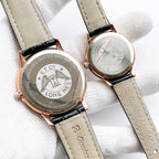 Longines quartz watch caseback with logo, rose-gold finish, on beige leather strap