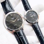 Longines quartz watch with dark dial and black leather strap, silver case