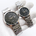 Longines quartz watch with black dial and silver steel bracelet