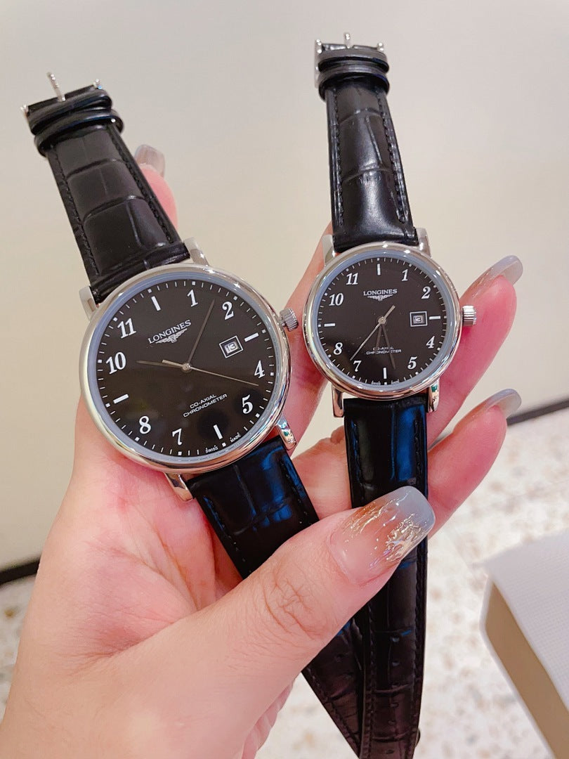 Pair of Longines watches with dark dials, black and blue leather straps, silver-tone cases.