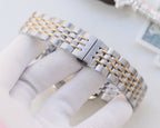 Longines wristwatch metal bracelet in a side view with clasp detail