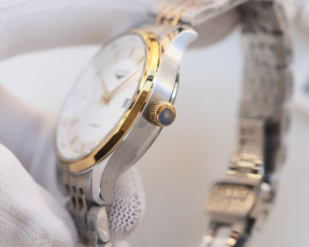 Longines wristwatch side profile with crown and two-tone metal bracelet