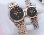Quartz wristwatches with metal link bracelets and dark dials, rose-gold tone