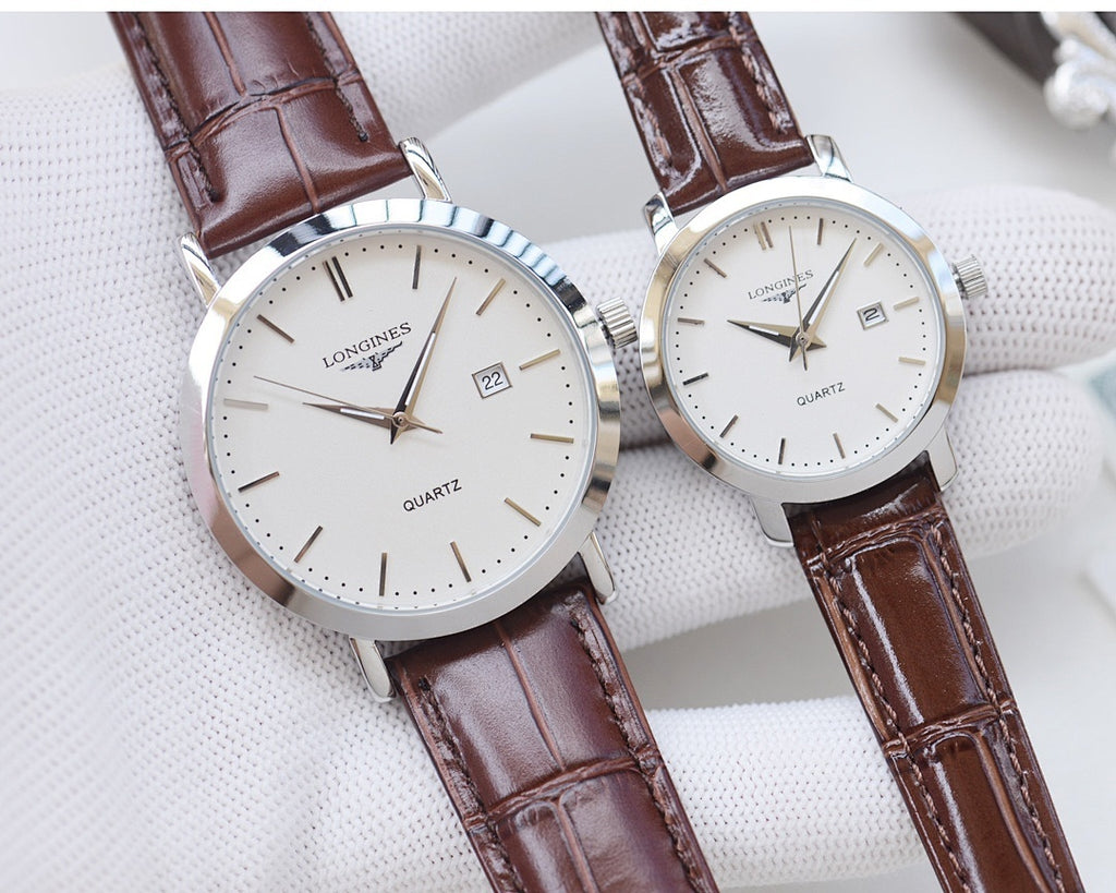 Quartz wristwatches with brown leather straps and white dials, silver cases