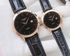 Quartz wristwatches with dark blue leather straps and black dials, rose-gold cases
