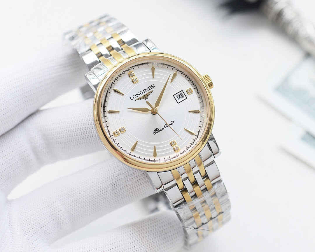 Longines wristwatch with two-tone bracelet, white dial, gold hands and logo markers.
