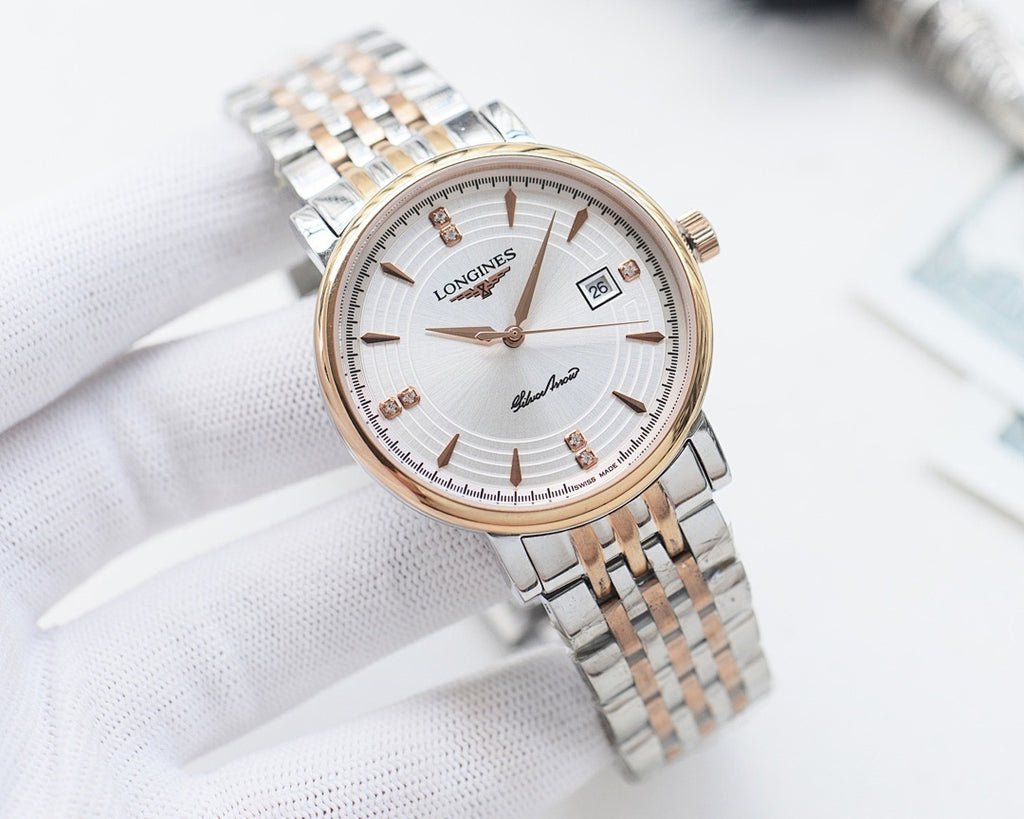 Longines wristwatch with two-tone bracelet, white dial, gold hour markers and subdial.
