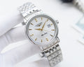 Longines wristwatch with silver-tone metal bracelet, white dial, gold hands and markers.