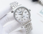 Longines wristwatch with silver-tone bracelet, white dial, gold hands and hour markers.