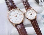 Longines watch pair with rose-tone case, brown leather strap, white dial
