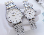 Longines watch pair with stainless steel bracelet and white dial