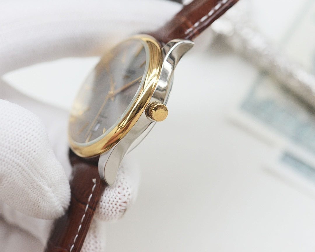 Longines wrist watch with gold-tone side case, crown detail, brown leather strap.