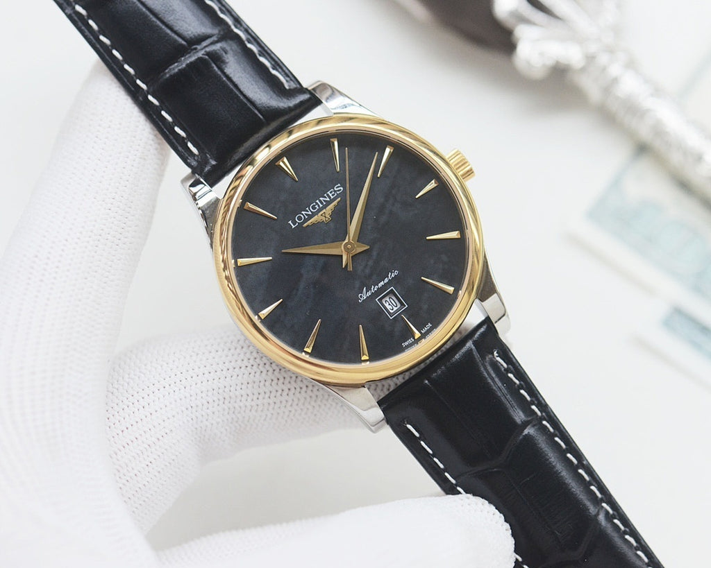 Longines wrist watch with gold-tone case, dark dial, black leather strap.