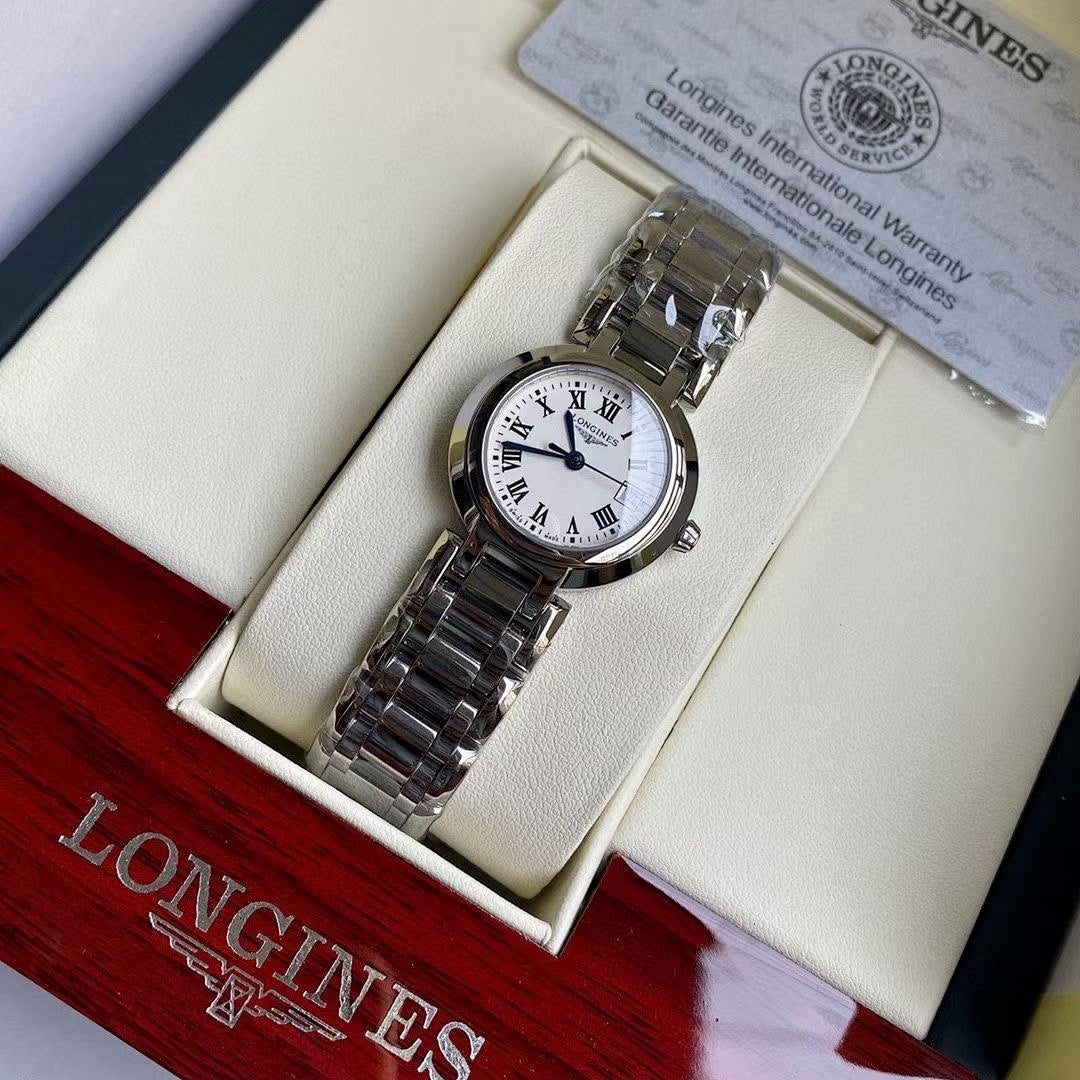 Longines watch displayed in presentation box with stainless steel bracelet and white dial