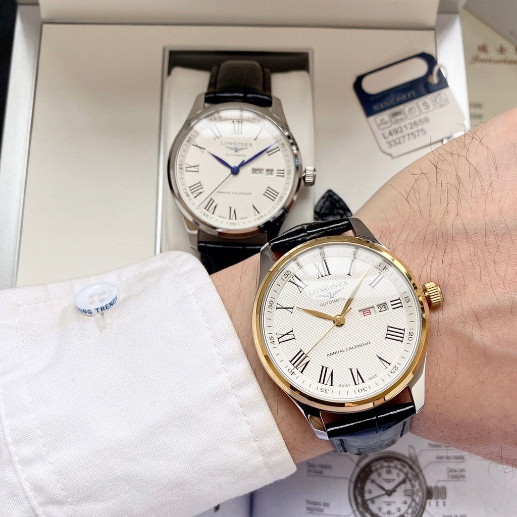Automatic watch with white dial, gold-toned case and black leather strap, day/date display
