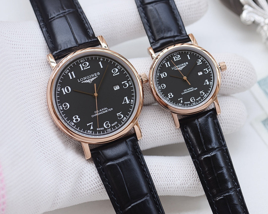 Longines watch set with rose-gold-tone cases, black dials, dark leather straps.