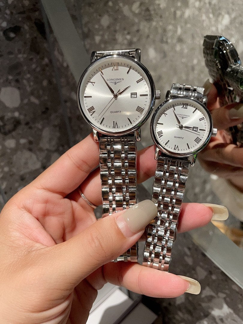 Pair of Longines quartz wristwatches, white dials, stainless steel metal bracelet