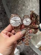 Pair of Longines quartz wristwatches, white dials, rose-gold tone metal bracelet
