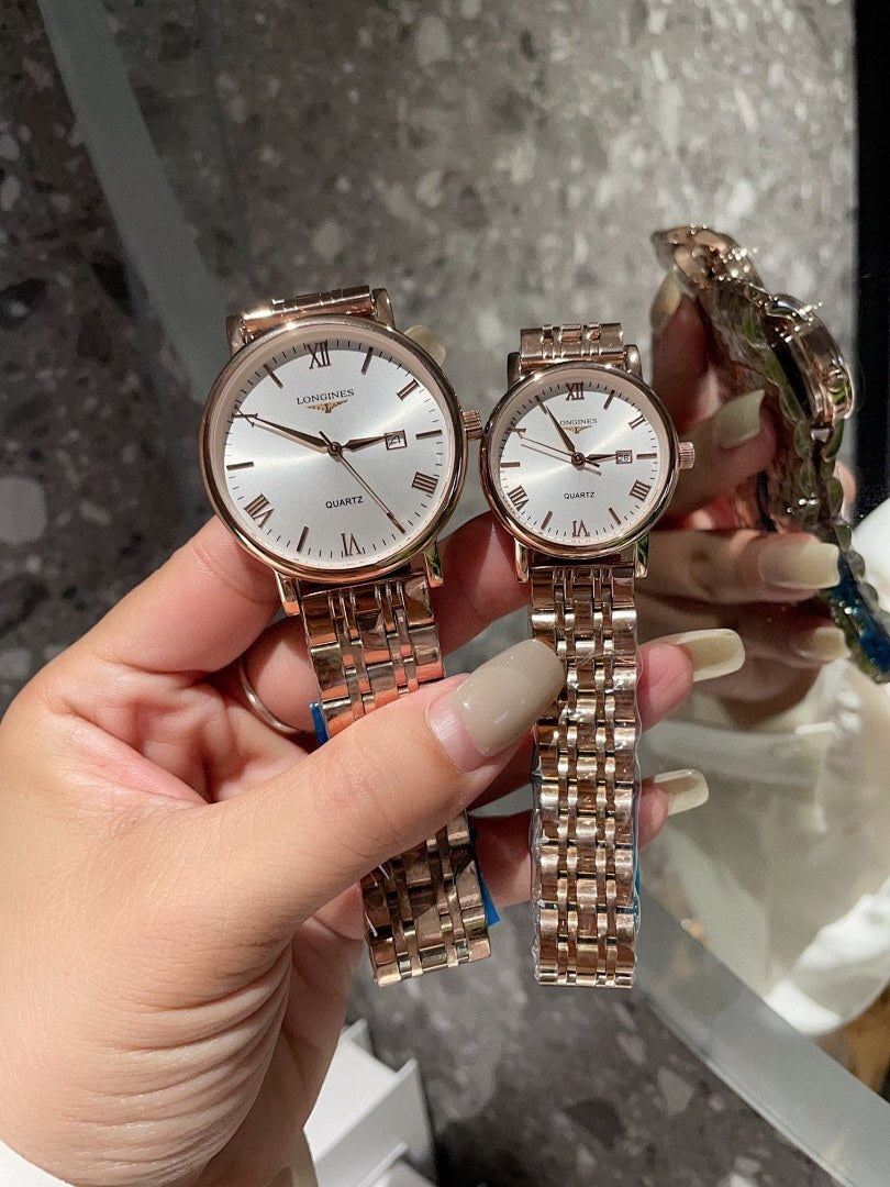 Pair of Longines quartz wristwatches, white dials, rose-gold tone metal bracelet