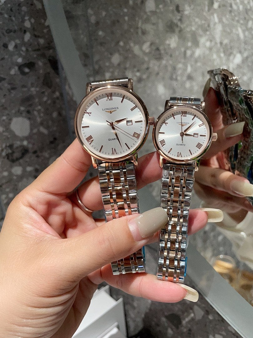 Two Longines quartz wristwatches, white dials, rose-gold tone link bracelet