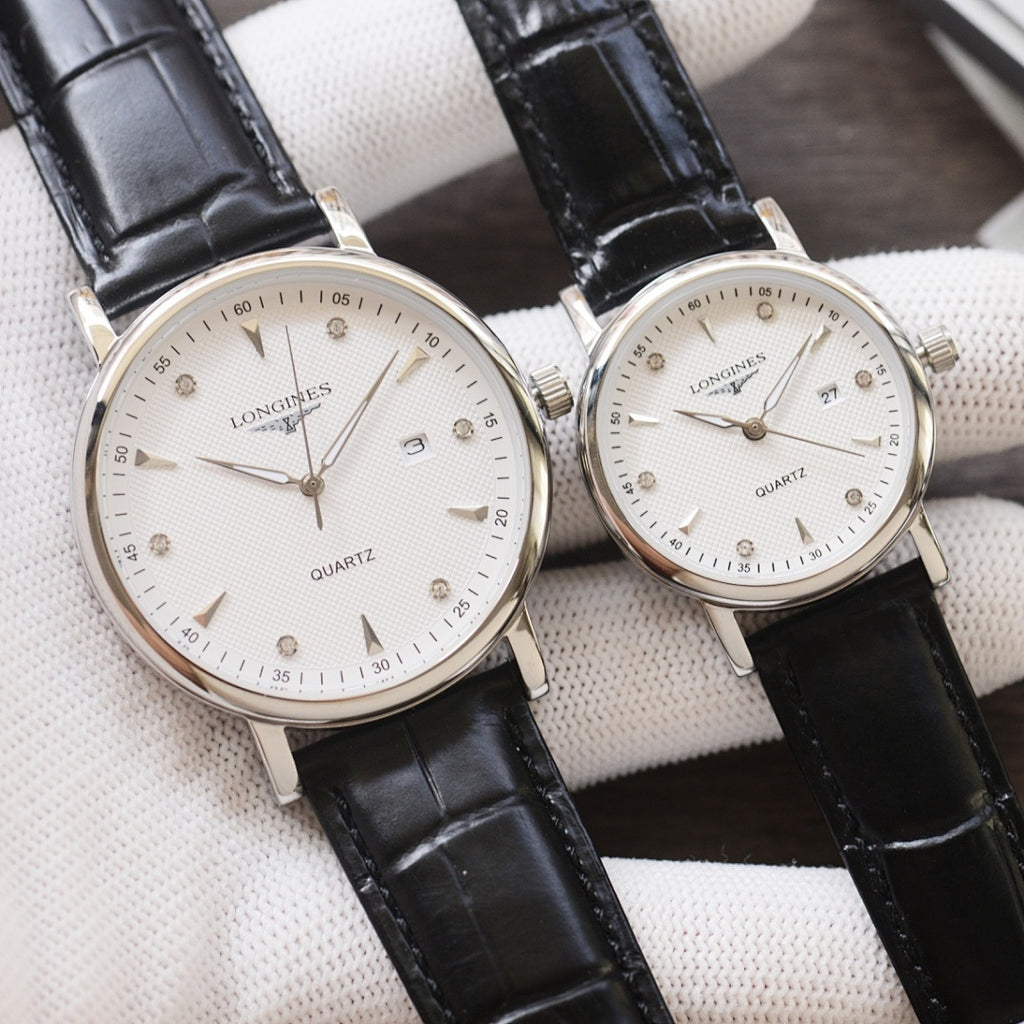 Longines quartz wristwatches with white dials and black leather straps, silver-tone cases, two-pack