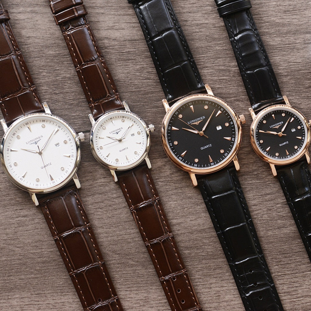 Assorted Longines quartz wristwatches with white and black dials, brown and black leather straps, four-pack