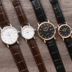 Assorted Longines quartz wristwatches with white and black dials, brown and black leather straps, four-pack