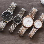 Assorted Longines quartz wristwatches with metal link bracelets and dark or white dials, four-pack
