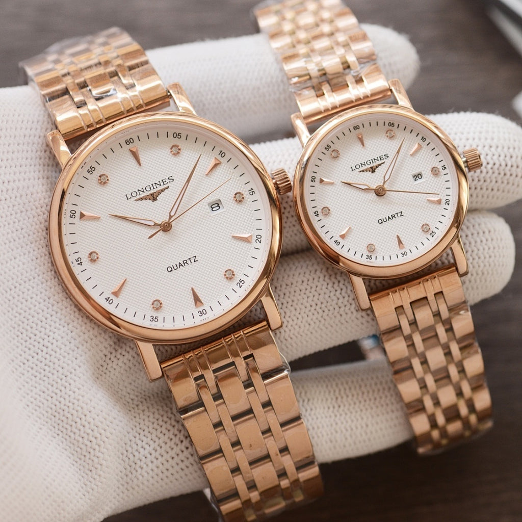 Longines quartz wristwatches with white dials and gold-tone link metal bracelets, two-pack