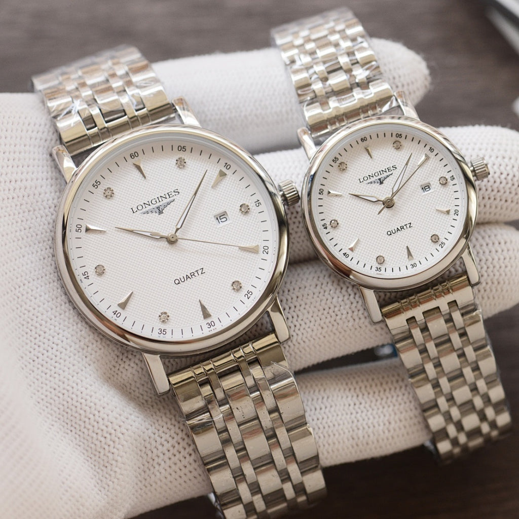 Longines quartz wristwatches with white dials and silver-tone link metal bracelets, two-pack