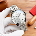 Longines automatic watch with white dial and silver link bracelet