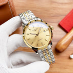 Longines automatic watch with gold bezel, champagne dial, and silver/gold link bracelet