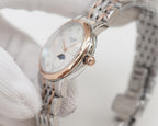 Longines watch with rose gold case, white dial, moonphase display, silver steel bracelet
