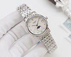 Longines watch with silver steel bracelet, white dial, moonphase and date window display