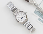 Longines watch with silver steel bracelet and white dial, moonphase subdial and roman numerals