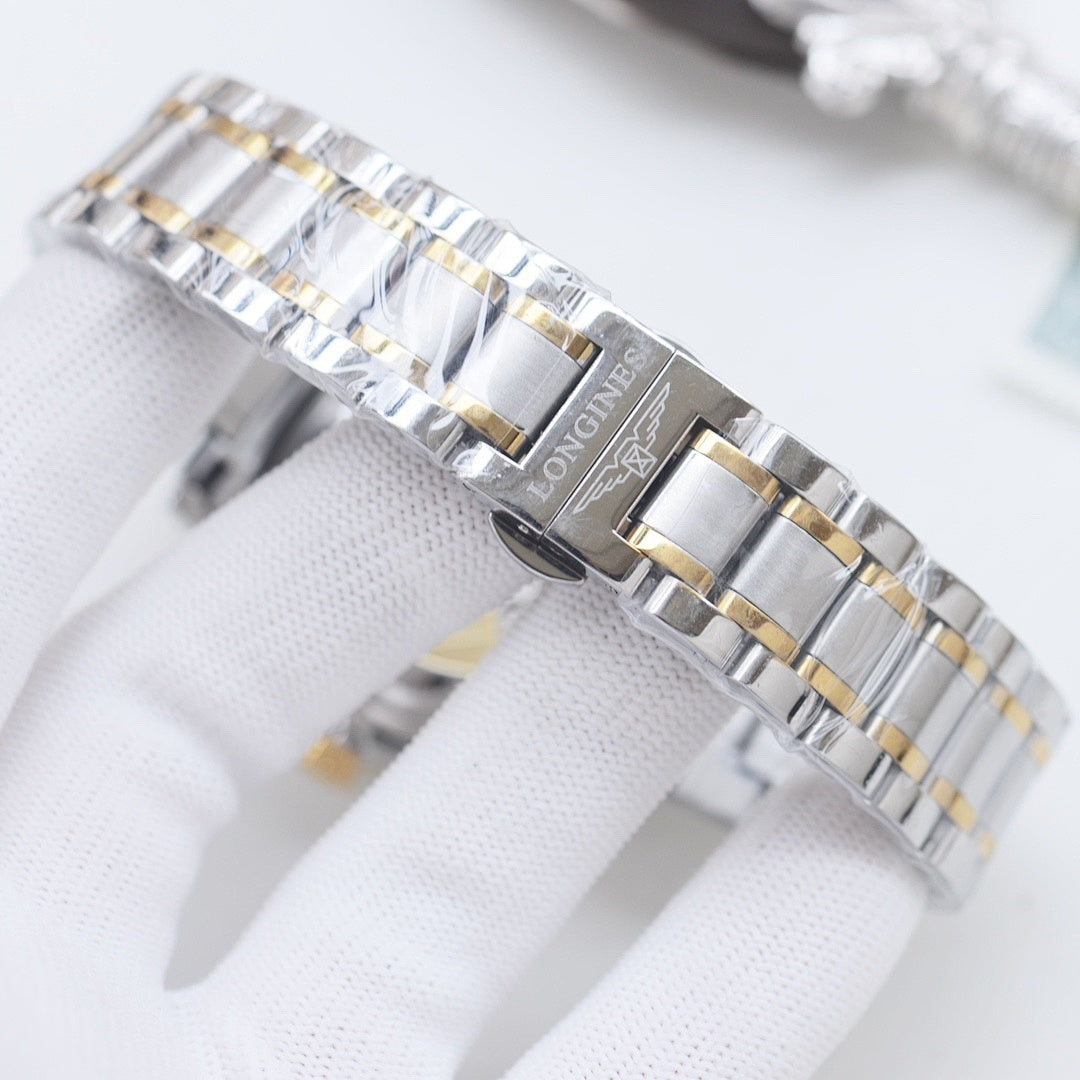 Longines two-tone stainless steel watch with gold accents, silver bracelet, white dial