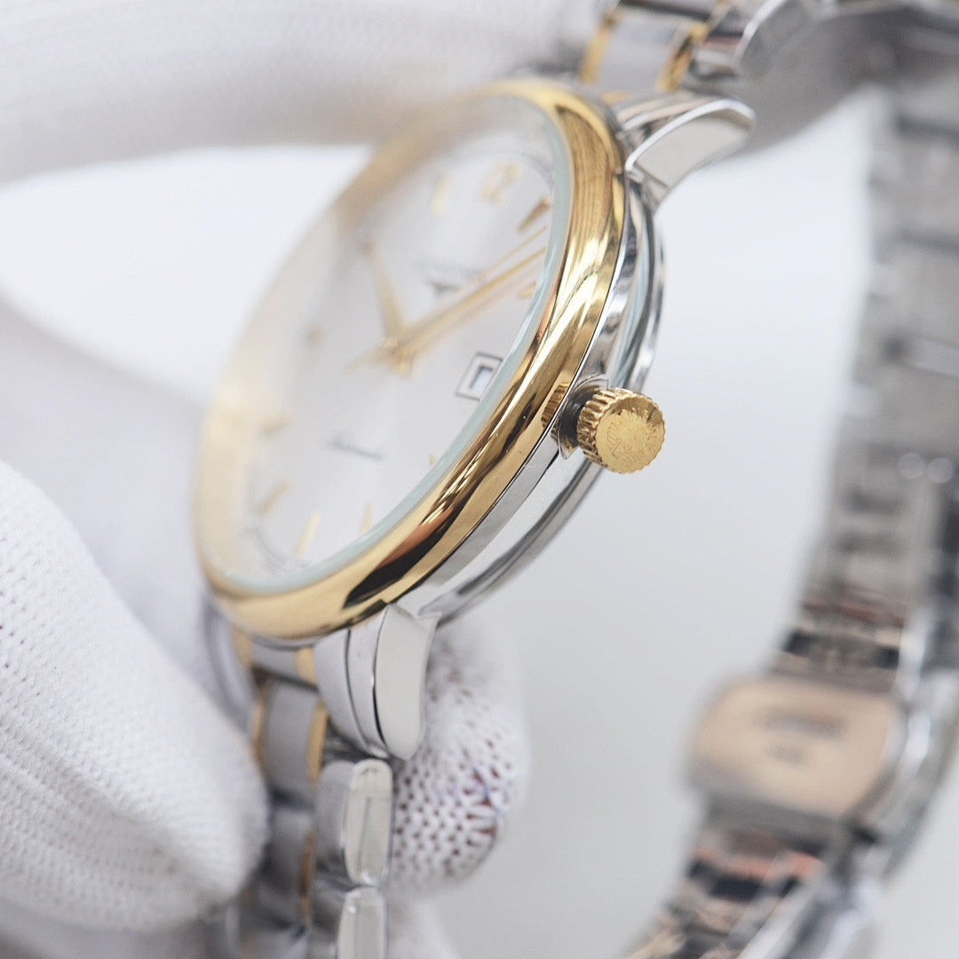 Longines gold-tone bezel watch with silver bracelet and white dial