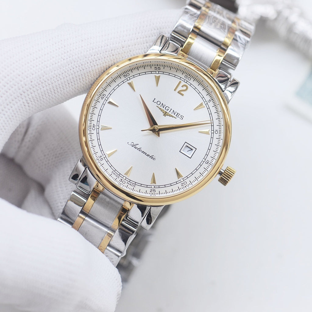 Longines two-tone watch with gold-tone bezel, silver bracelet, and white dial