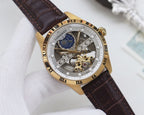 Gold-tone analog watch with black dial, blue subdial, skeleton details, brown leather strap