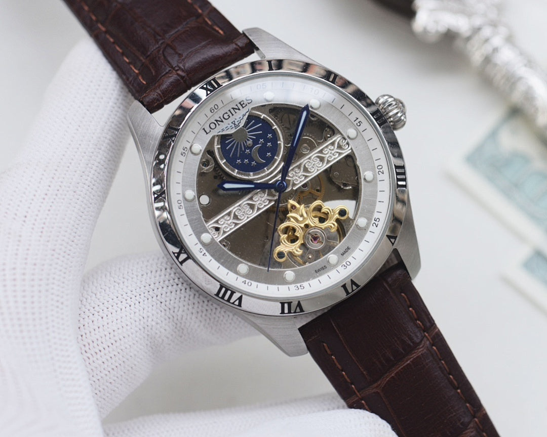 Steel-tone analog watch with black dial, blue subdial, skeleton movement, brown leather strap