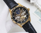 Gold-tone Longines watch with black dial, blue subdial, skeleton movement, black leather strap