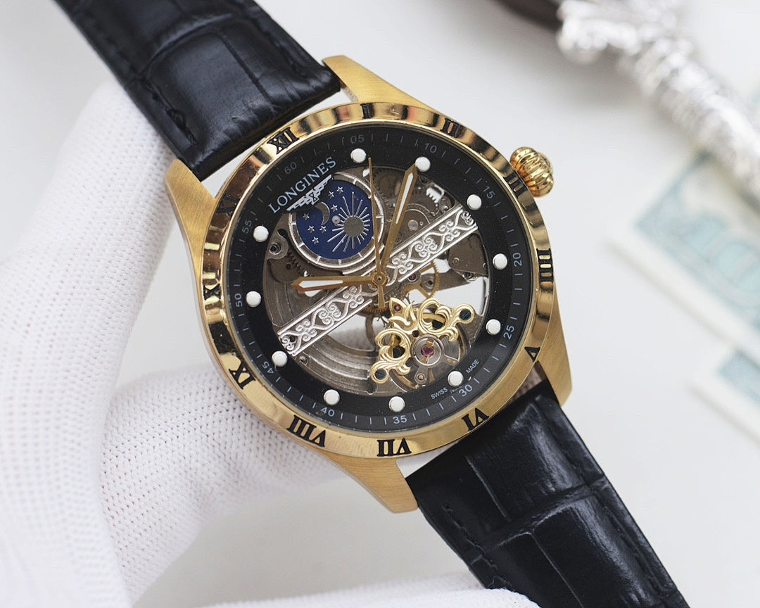 Gold-tone Longines watch with black dial, blue subdial, skeleton movement, black leather strap