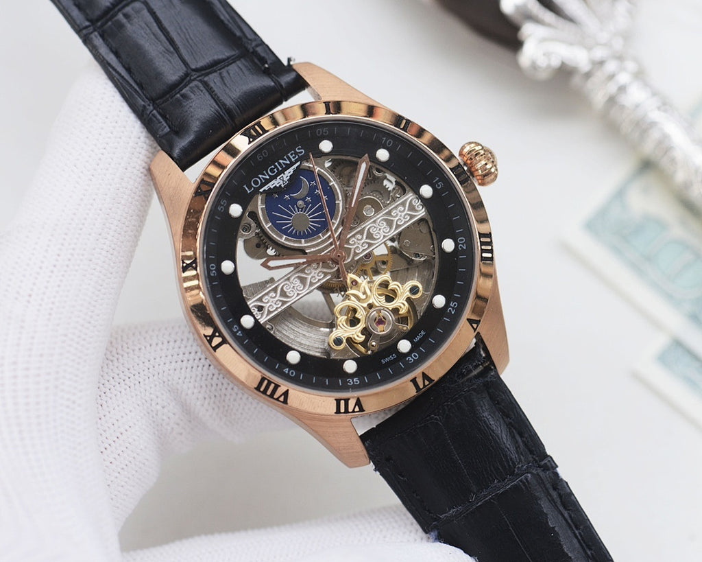 Gold-tone analog watch with black dial, blue subdial, skeleton movement, black leather strap